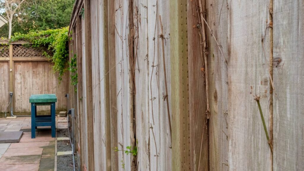 a wooden retaining wall fence - Fixing or replacing your retaining wall